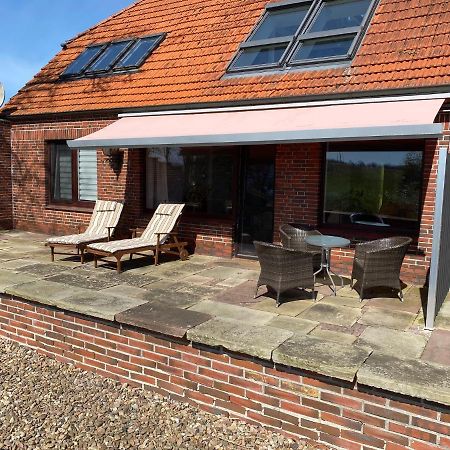 Funnys Deichblick Apartamento Butjadingen Exterior foto